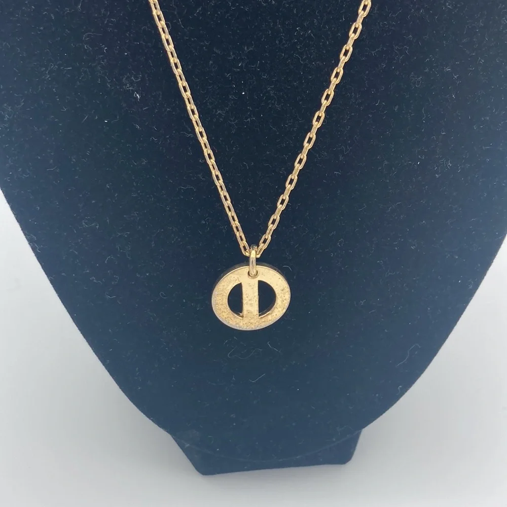 CHRISTIAN DIOR PEDANT GOLD TONE NECKLACE